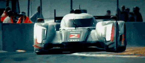 The #2 Audi E-Tron Quattro curb hopping at Le Mans